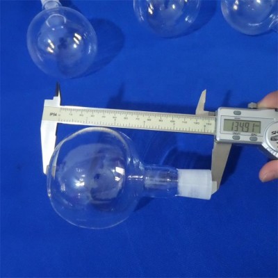 The molten quartz round bottom flask